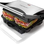Aigostar Hett 30HHJ - Grill multifonction, plancha, presse à paninis, appareil à sandwichs. 1000W, plaques anti-adhésives, poignée froide. Sans BPA. Couleur argent et noir. Design exclusif.